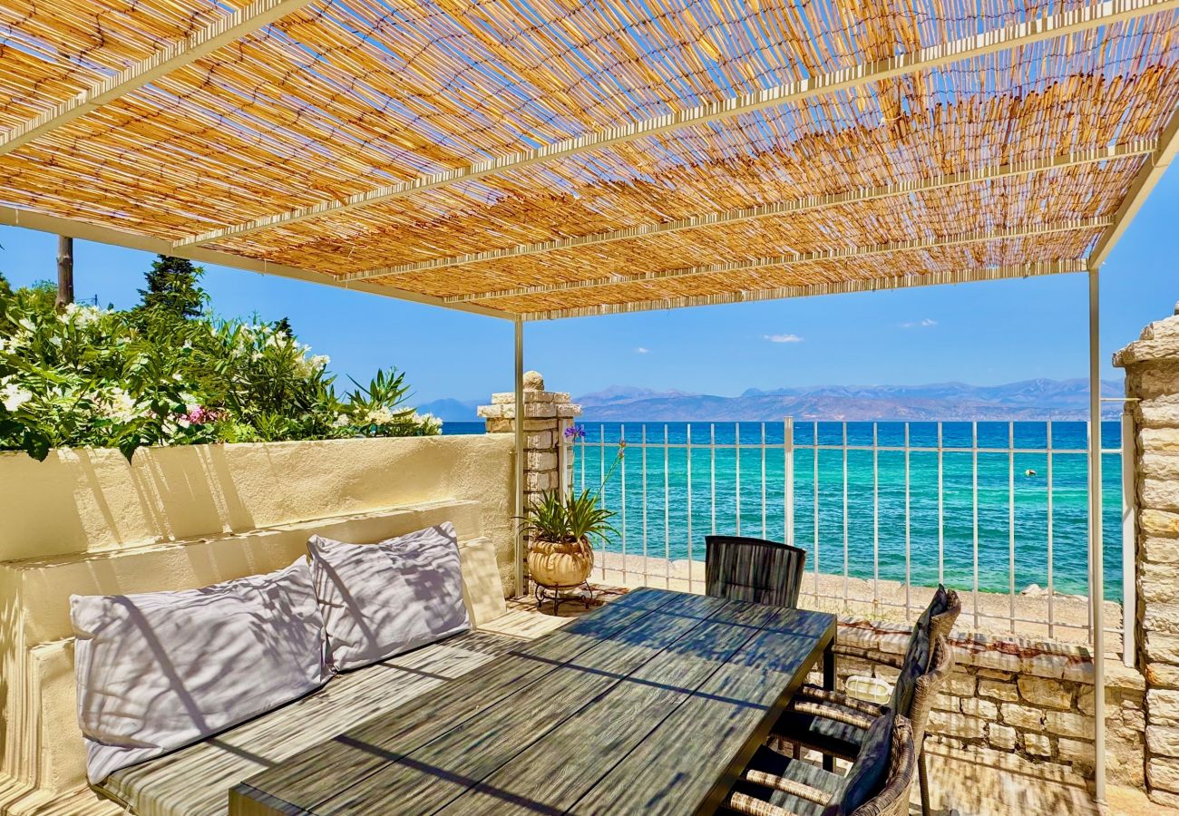 Villa in Kassiopi - Beach House Christina with private heated pool