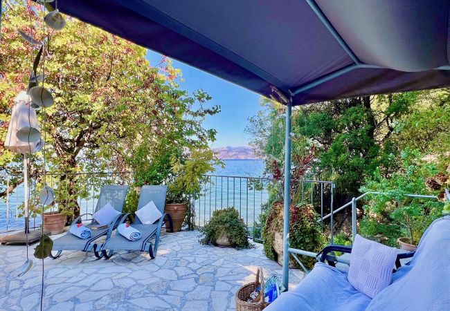 Villa in Kassiopi - Apraos Beachfront House Villa in Kassiopi - Apraos Beachfront House